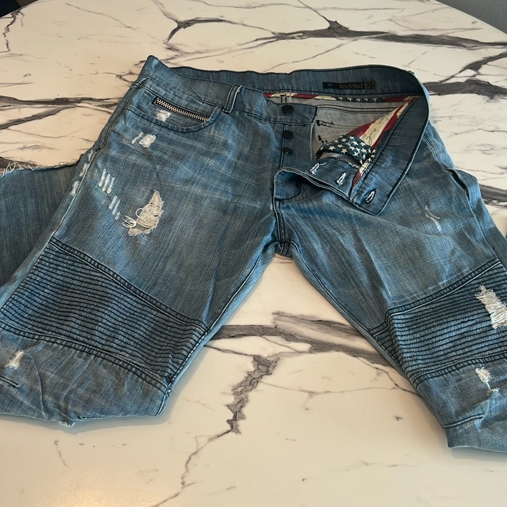 Rockstar jeans distressed cut off with slight flare reinforced knee